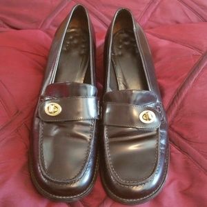 Coach loafers with stacked heel.